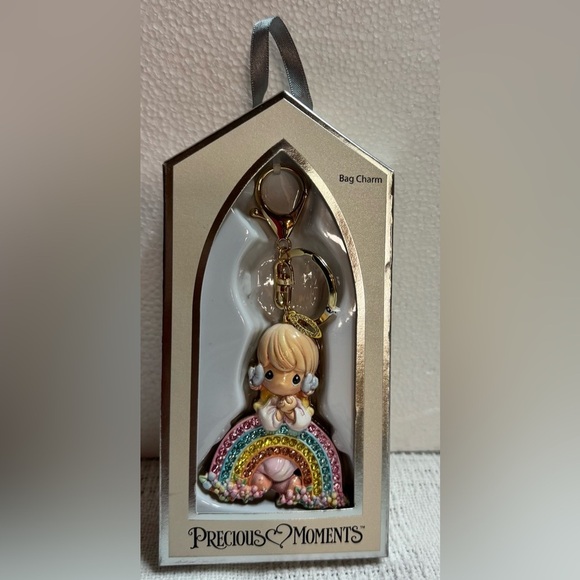 Precious Moments Accessories - Precious Moments Bag Charm Key Chain
Angel Blessed Communion Girl & Rainbow